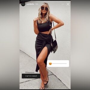 Vici Black Midi Skirt with Front Twist and Side Slit